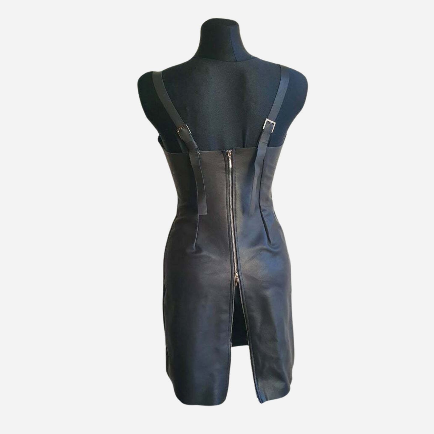 Genuine Leather sexy cup-less bodycon dress with adjustable straps and zipper fastening back.