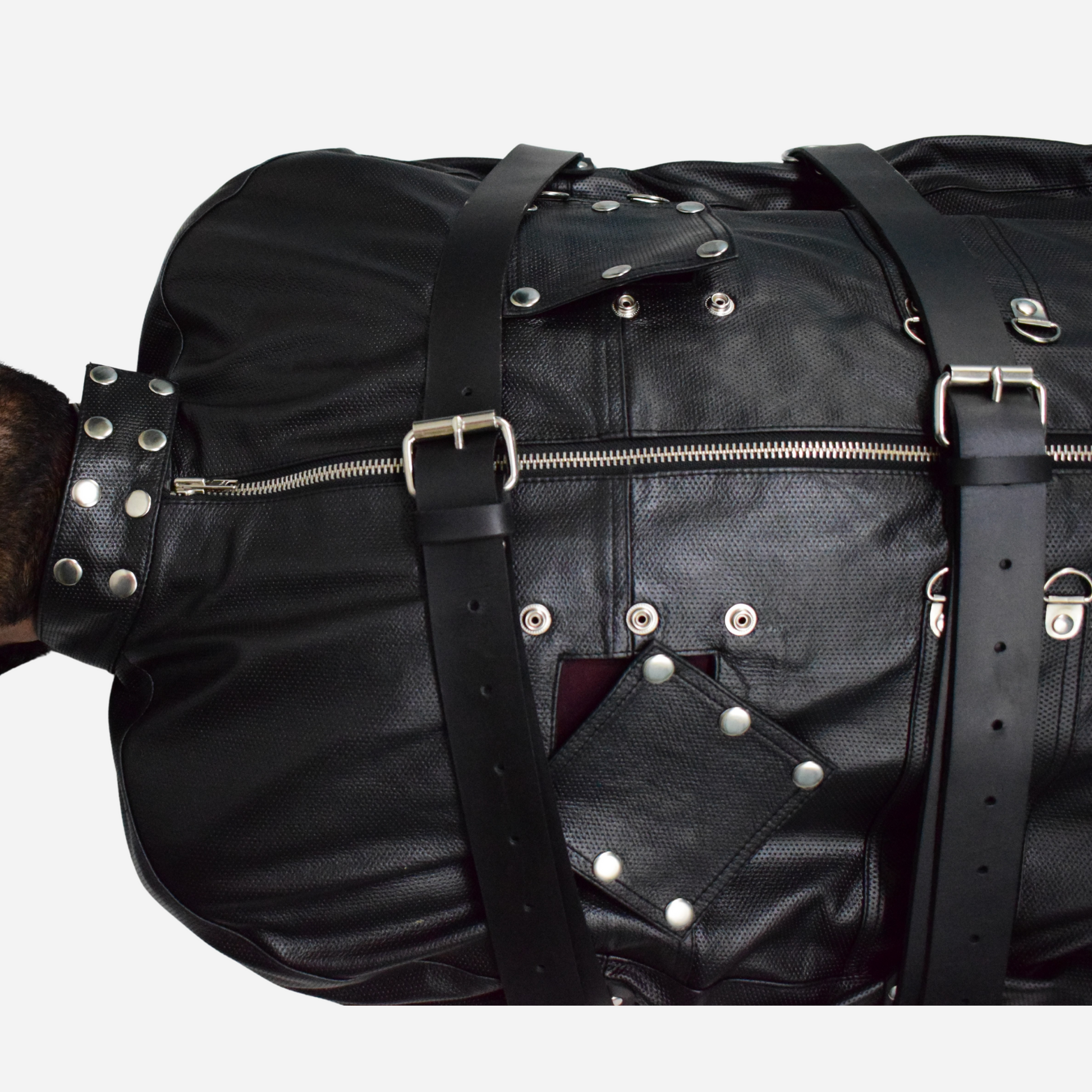 Body Bag, crafted from 100% genuine leather. Features a versatile 3-way YKK zipper, with lining options. It has adjustable belts all around the body. 