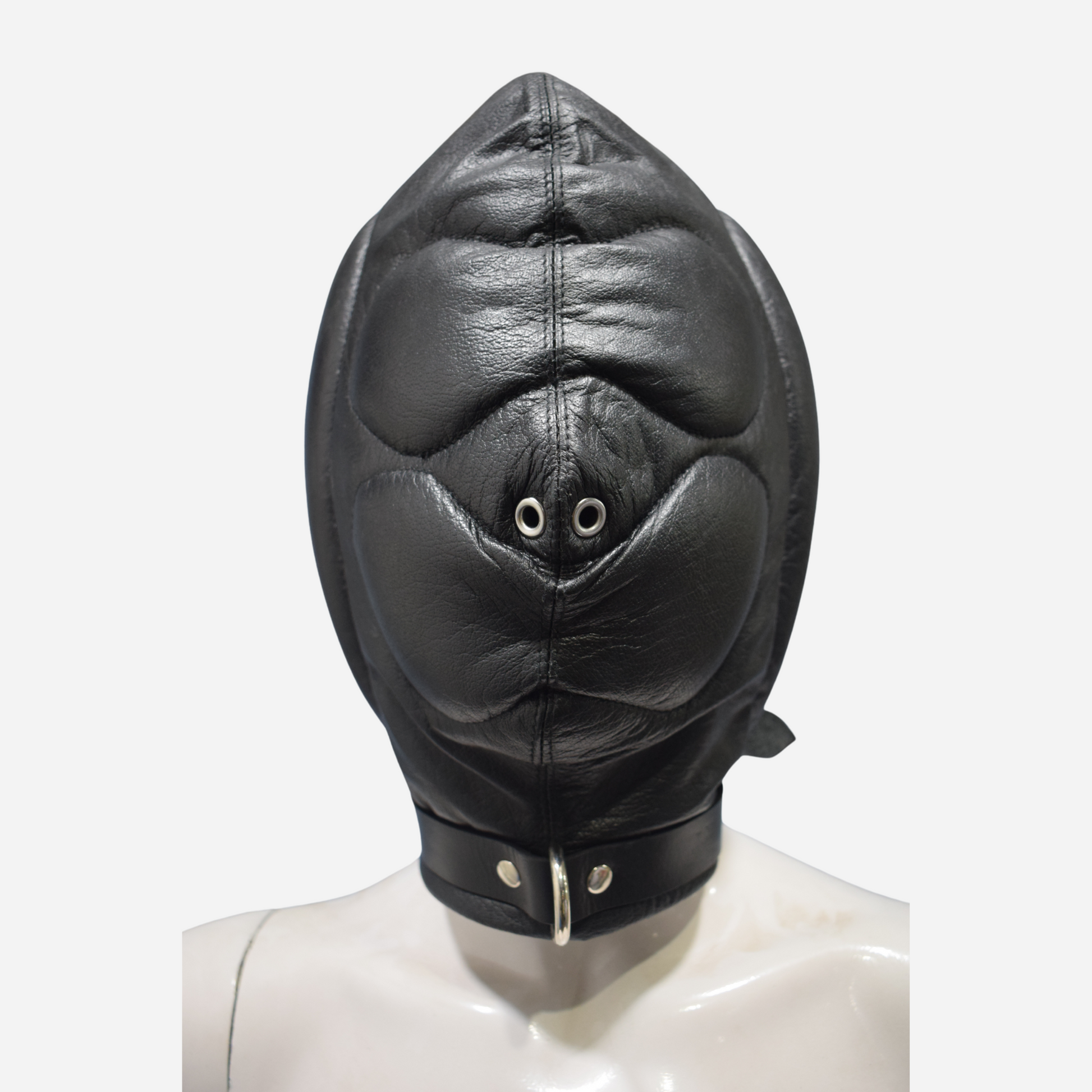 Upgrade your wardrobe with our Premium Genuine Leather Padded Hood. Made from 100% finest quality leather, this stylish black hood features soft padding, adjustable collar with D-ring, lace-up back closure, and double-stitch durability. One size fits all (22" head circumference). Shop now for luxury and comfort!