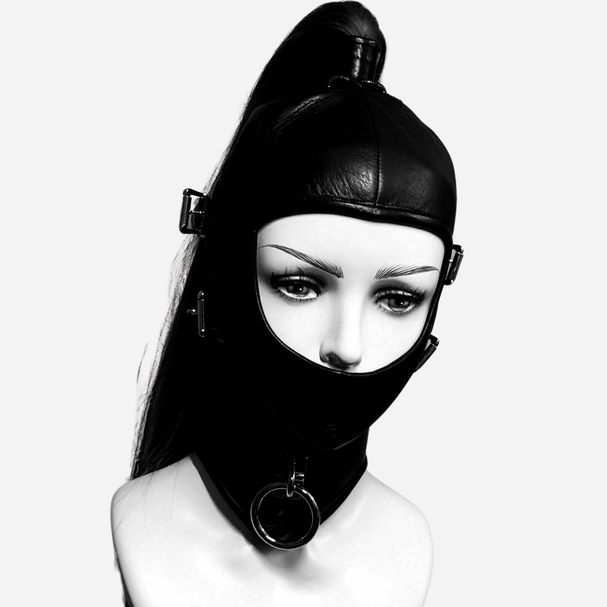 "Discover the ultimate in style and sensation with our premium Hood Mask. Perfect for BDSM, fetish, and sensory play, this adjustable mask offers comfort and versatility. Made from high-quality materials, it enhances your kink experience and adds a touch of elegance. Shop now for unique bondage gear."