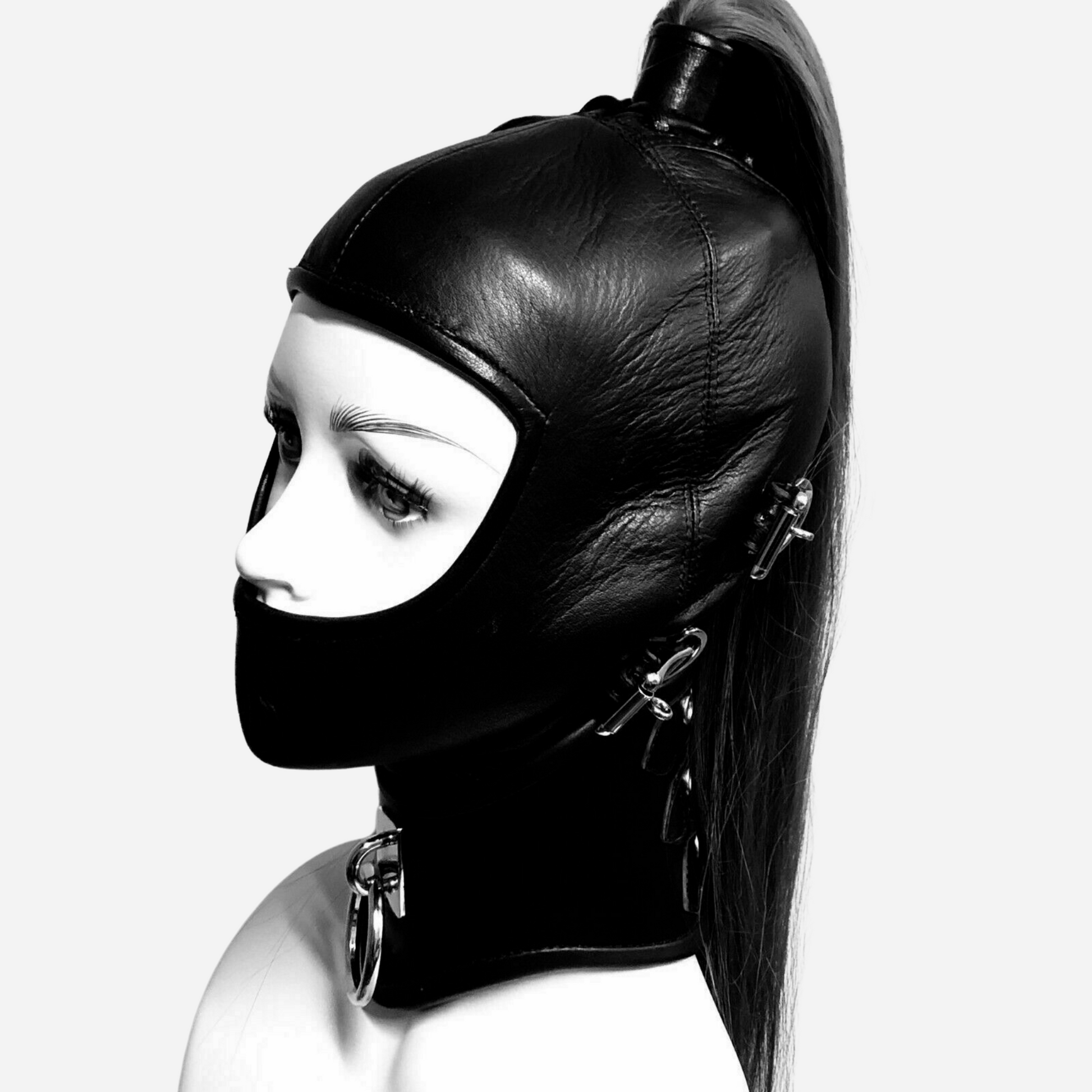 "Discover the ultimate in style and sensation with our premium Hood Mask. Perfect for BDSM, fetish, and sensory play, this adjustable mask offers comfort and versatility. Made from high-quality materials, it enhances your kink experience and adds a touch of elegance. Shop now for unique bondage gear."